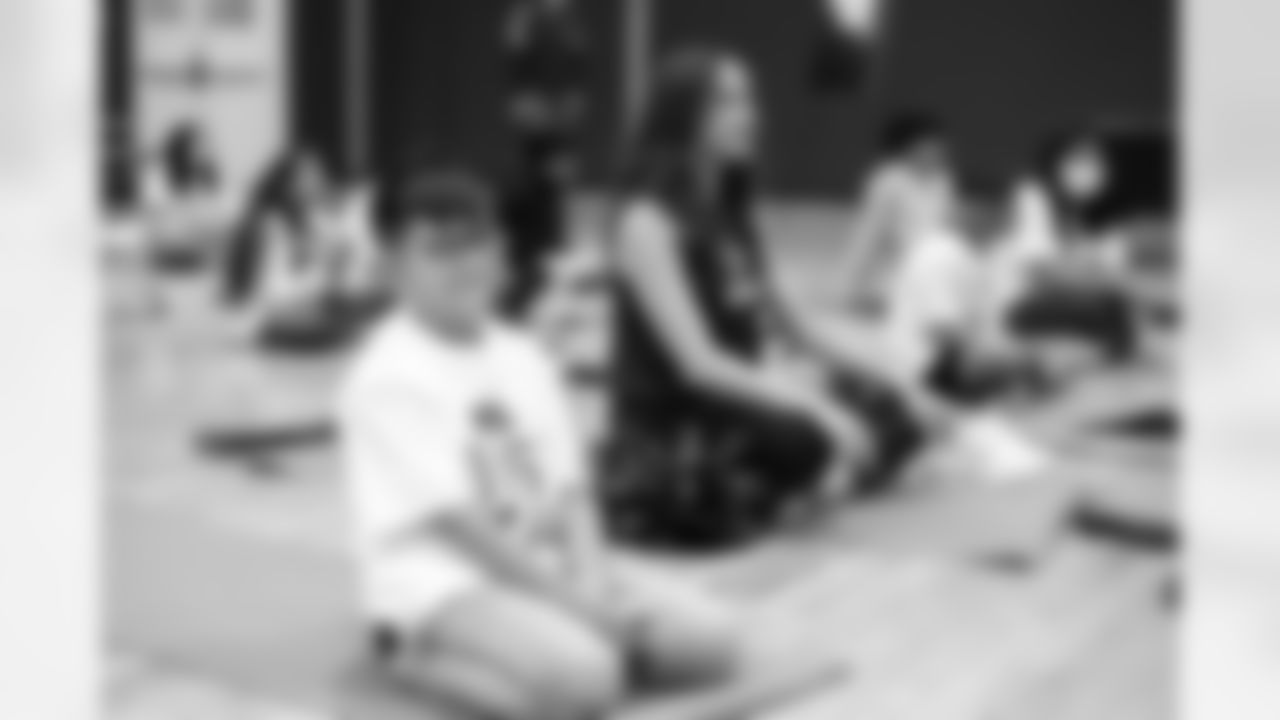 An Oct. 19, 2022 Image from the Texans Youth Just Flow Yoga Event at Havard Boys & Girls Club in Houston, TX.