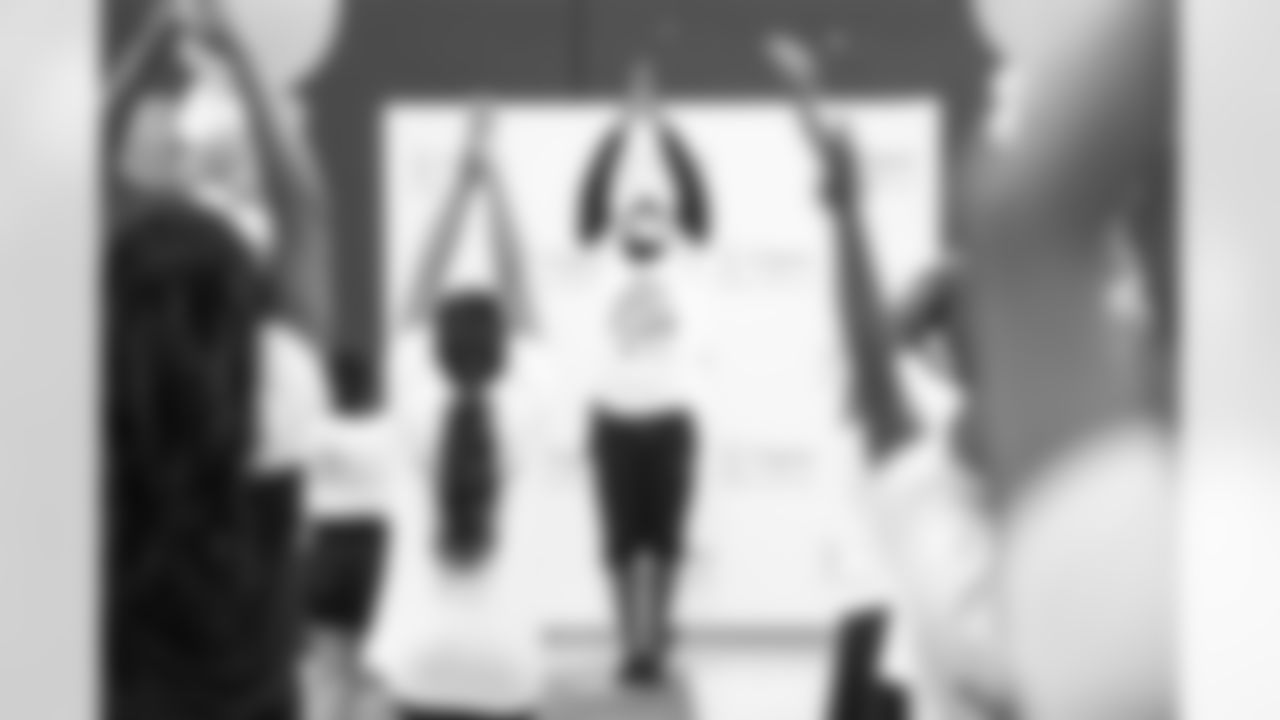 An image from the Cigna Just Flow Yoga event at the Harvard Boys and Girls Club in Houston, Texas, on Nov. 3, 2021.