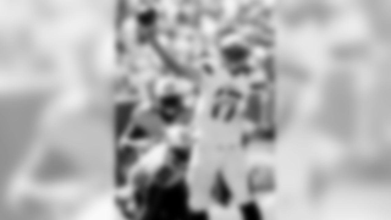 San Diego Chargers quarterback Philip Rivers throws a pass against the Tennessee Titans during the first quarter of an NFL football game, Sunday, Sept. 16, 2012, in San Diego. (AP Photo/Lenny Ignelzi)