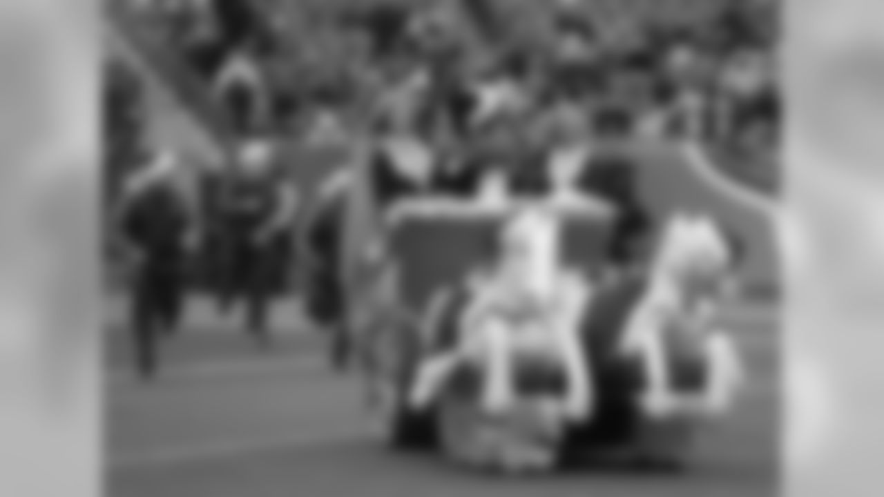 Tennessee Titans mascot T-Rac rides onto the field with cheerleaders before an NFL football game against the Los Angeles Rams Sunday, Dec. 24, 2017, in Nashville, Tenn. (AP Photo/James Kenney)