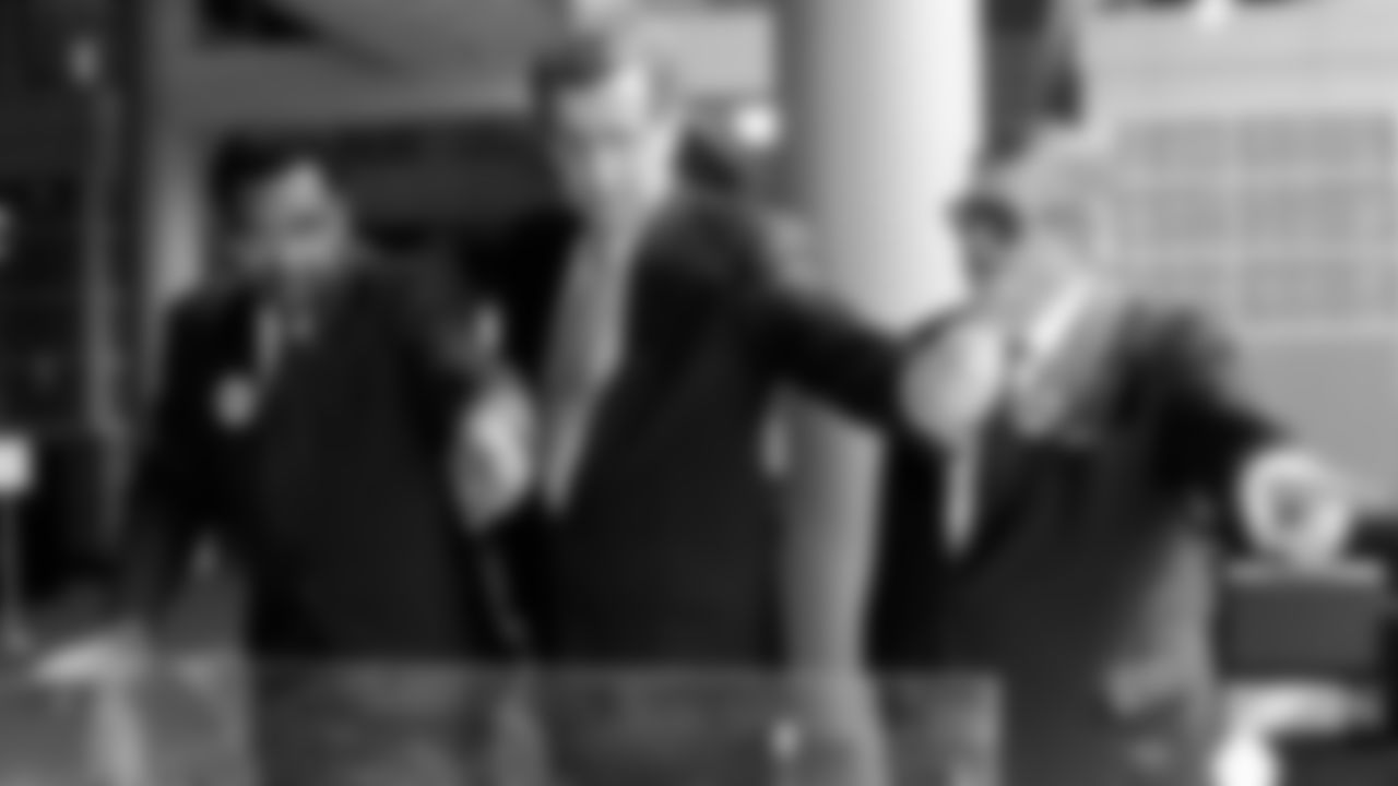Tennessee State University President James A. Hefner, left, NFL Commissioner Paul Tagliabue and Houston Oilers owner Bud Adams, right, all point in the same direction when an onlooker asked where the Tennesse State campus is from the proposed NFL stadium as they look over a model of the stadium Monday, May 6, 1996. Tagliabue and Adams are visiting the Nashville campus as one of several stops on the day before voters decide whether to spend public money on the 65,000-seat stadium. (AP Photo/Mark Humphrey)