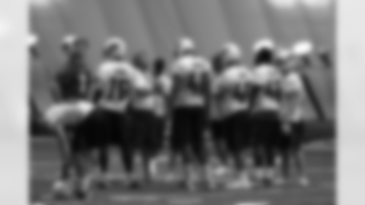 Titans players practice inside during Tuesday's organized training activity (OTA) at Baptist Sports Park in Nashville, Tenn.