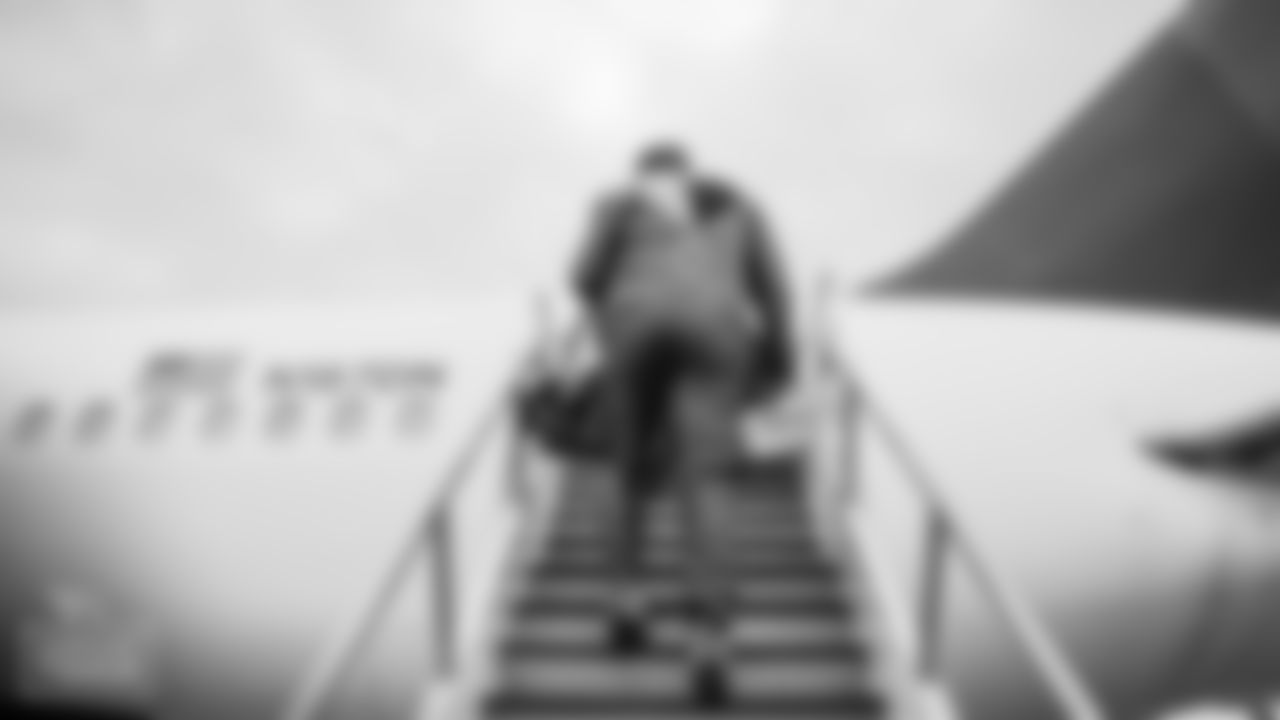 Tackle Taylor Lewan #77 of the Tennessee Titans on the tarmac for travel day to Pittsburgh for game vs the Jaguars on October 09, 2021 in Nashville, TN. Photo By Cameron Faulkner/Tennessee Titans