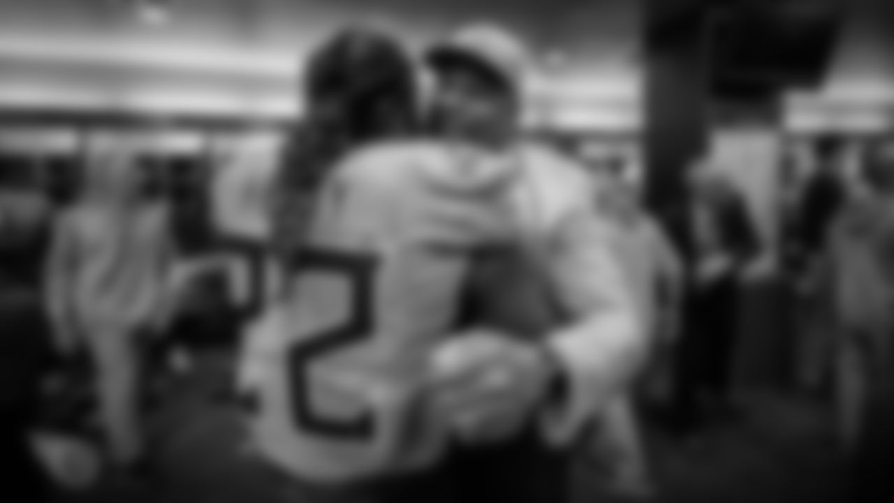 NASHVILLE, TN - NOVEMBER 10, 2019 - Running back Derrick Henry #22 of the Tennessee Titans celebrates with Hall of Famer Robert Brazile the win in the locker room after the game between the Tennessee Titans and the Kansas City Chiefs at Nissan Stadium in Nashville, TN. Photo By Donald Page/Tennessee Titans
