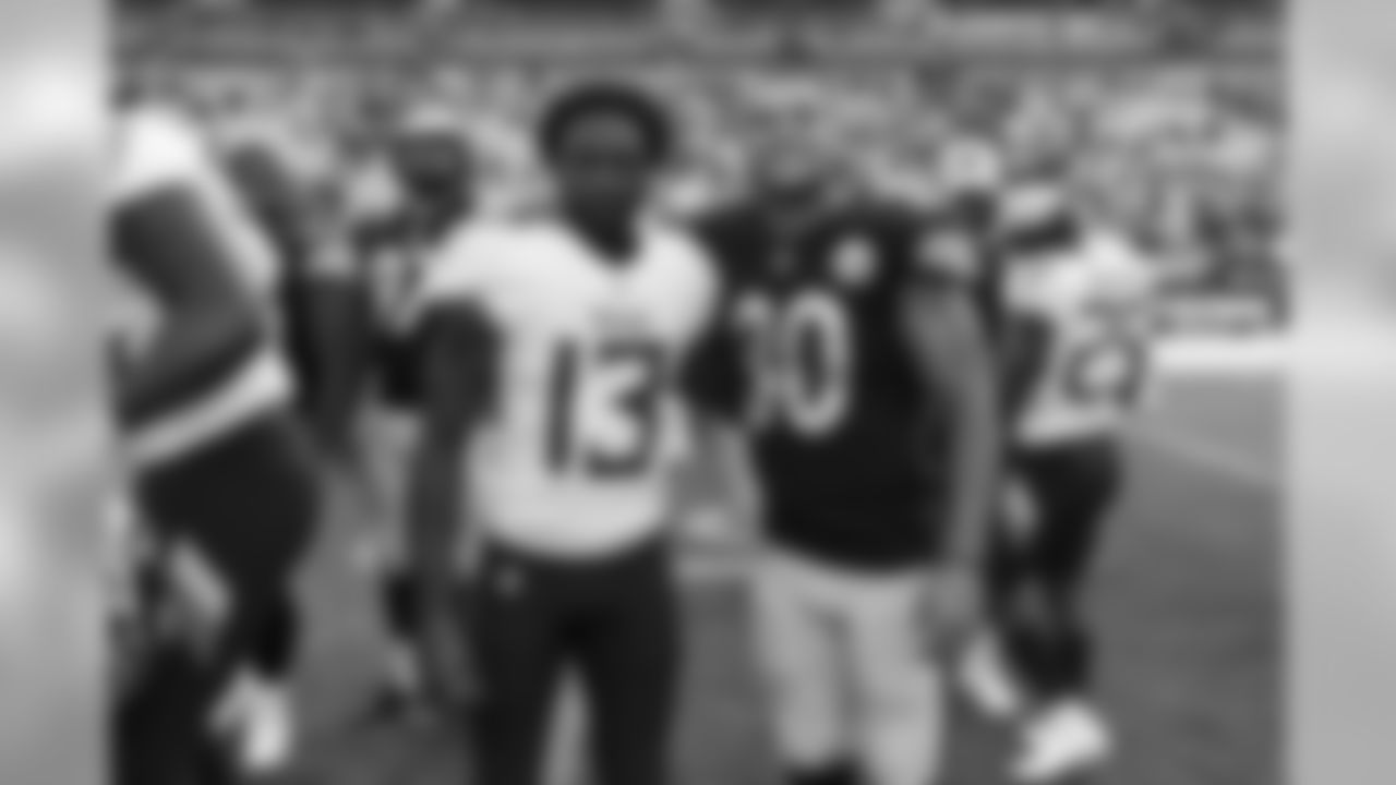 Tennessee Titans wide receiver Taywan Taylor (13) and Pittsburgh Steelers cornerback Jamar Summers (30) after an NFL preseason football game on Saturday, Aug. 25, 2018 in Pittsburgh. The Steelers won, 16-6. (Ric Tapia via AP)