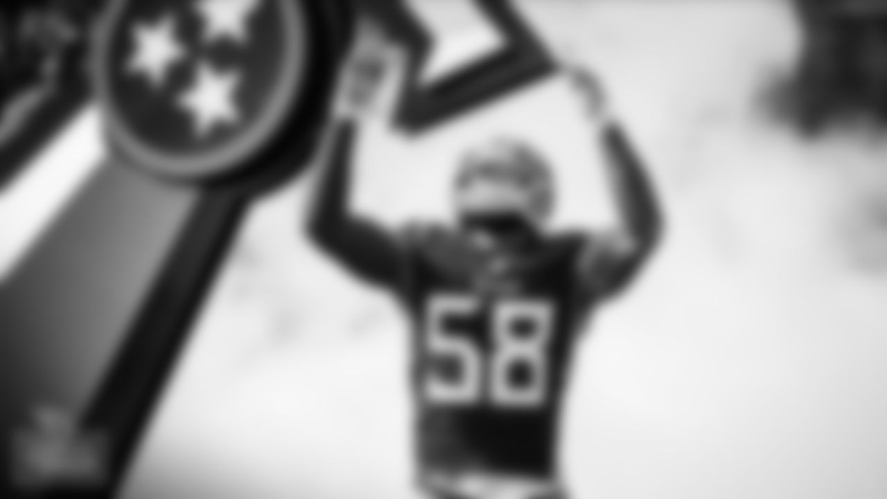 Outside linebacker Harold Landry III #58 of the Tennessee Titans during introductions before the game between the Tennessee Titans and the New Orleans Saints at Nissan Stadium on November 14, 2021 in Nashville, TN. Photo By Joe Howell/Tennessee Titans