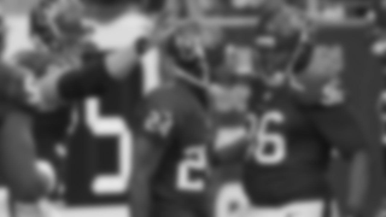 Houston Texans' Johnathan Joseph (24) celebrates with teammates after he returned an interception for a touchdown during the third quarter of an NFL football game against the Cincinnati Bengals, Sunday, Nov. 23, 2014, in Houston. (AP Photo/David J. Phillip)