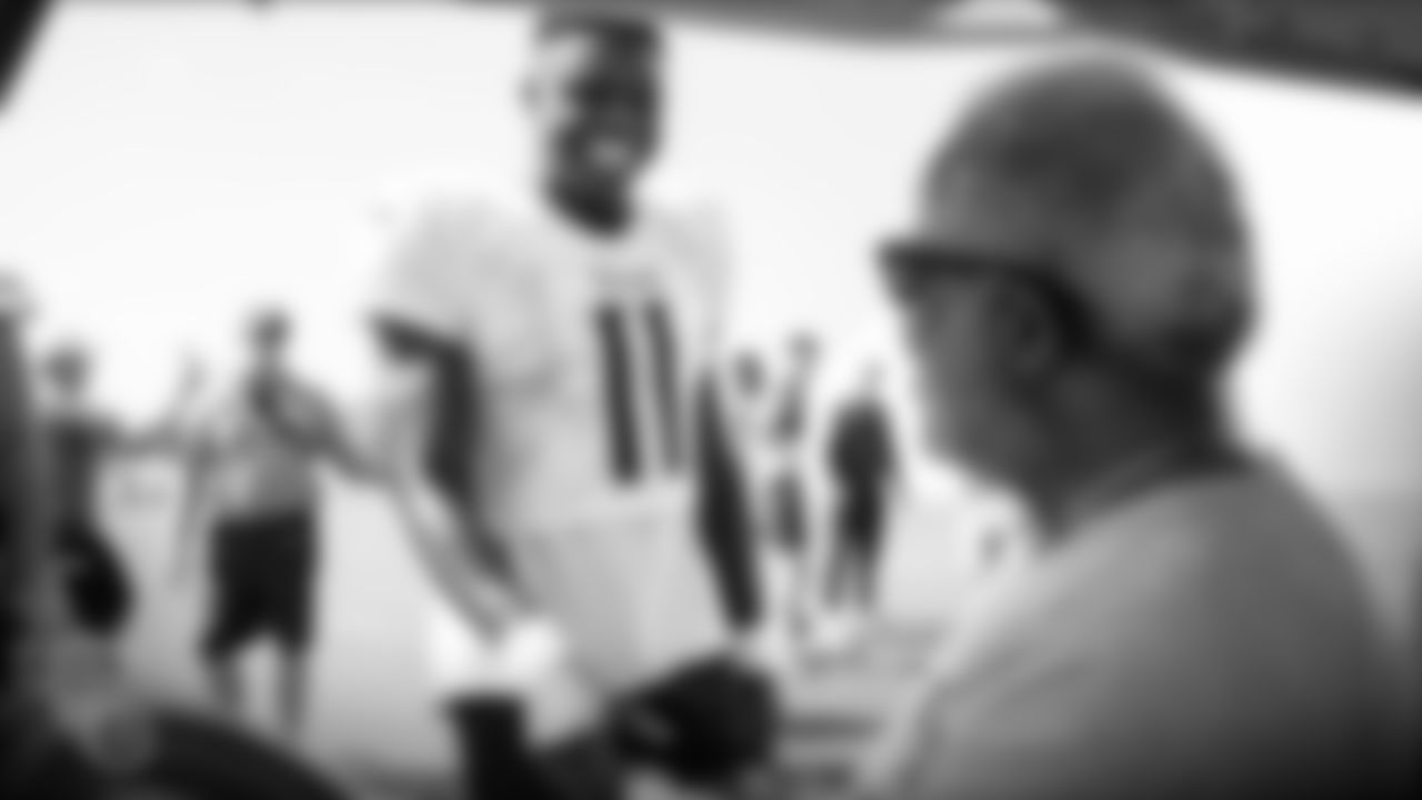 NASHVILLE, TN - OCTOBER 03, 2019 - Earl Campbell talks to Wide receiver A.J. Brown #11 of the Tennessee Titans after practice at Saint Thomas Sports Park in Nashville, TN. Photo By Donald Page/Tennessee Titans