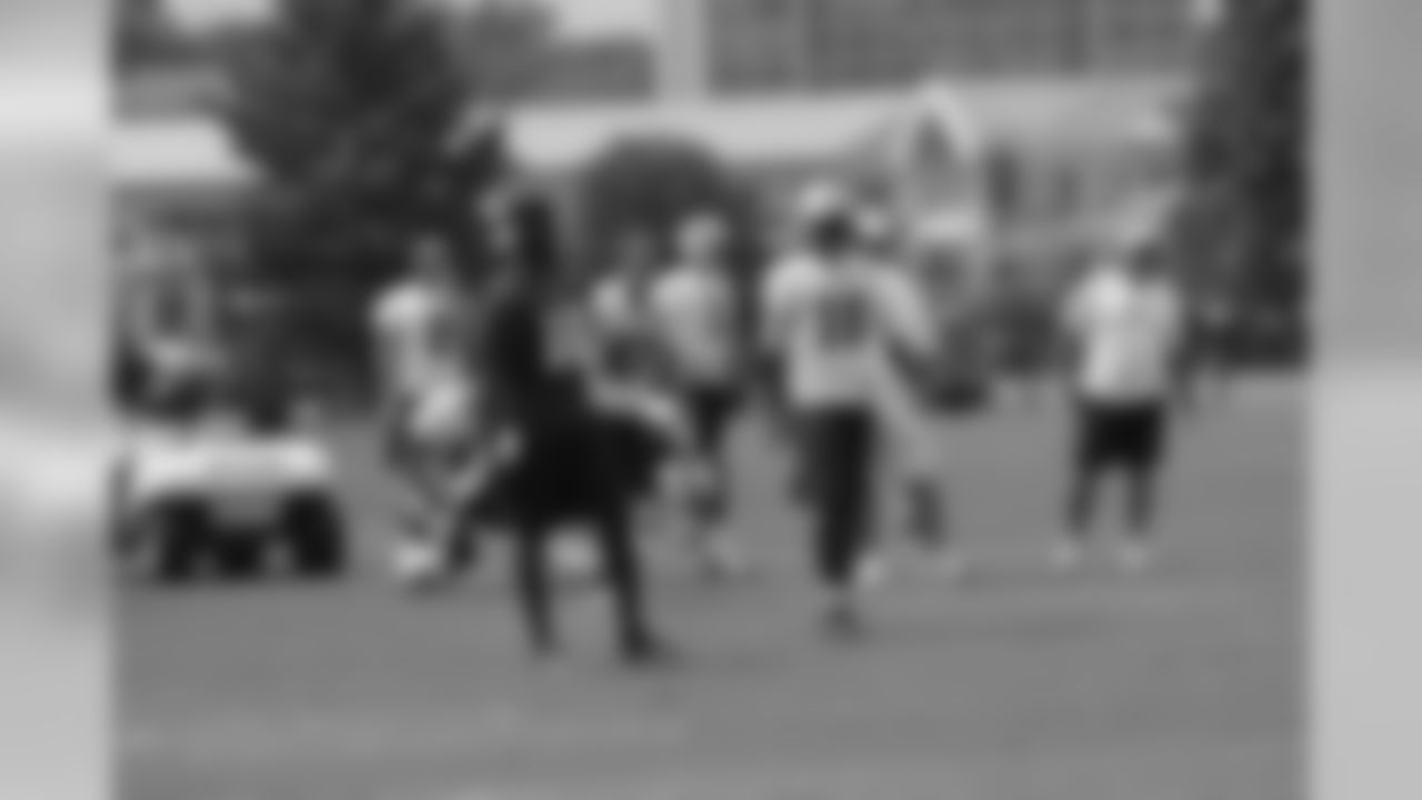 Titans players practice outside during Thursday's organized training activity (OTA) at Baptist Sports Park in Nashville, Tenn.
