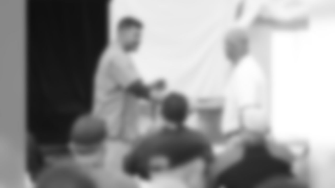 NASHVILLE, TN - JUNE 04, 2019 - head coach Mike Vrabel of Tennessee Titans shakes hands with Jeremy Pruitt of the Tennessee Volunteers Coaching Clinic event in Nashville, TN. Photo By Donald Page/Tennessee Titans