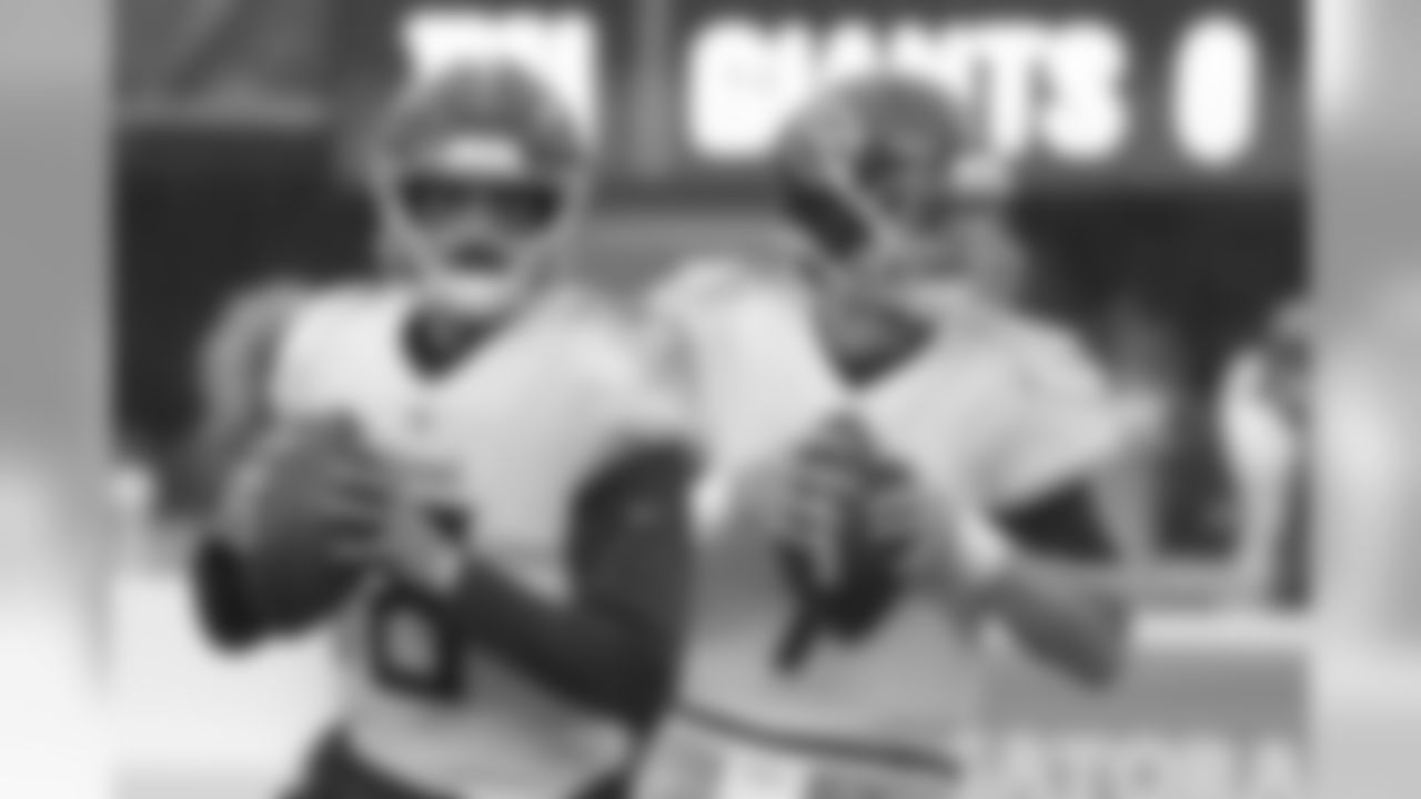 Tennessee Titans quarterback Marcus Mariota (8) and quarterback Blaine Gabbert (7) work out prior to an NFL football game against the New York Giants, Sunday, Dec. 16, 2018, in East Rutherford, N.J. (AP Photo/Bill Kostroun)
