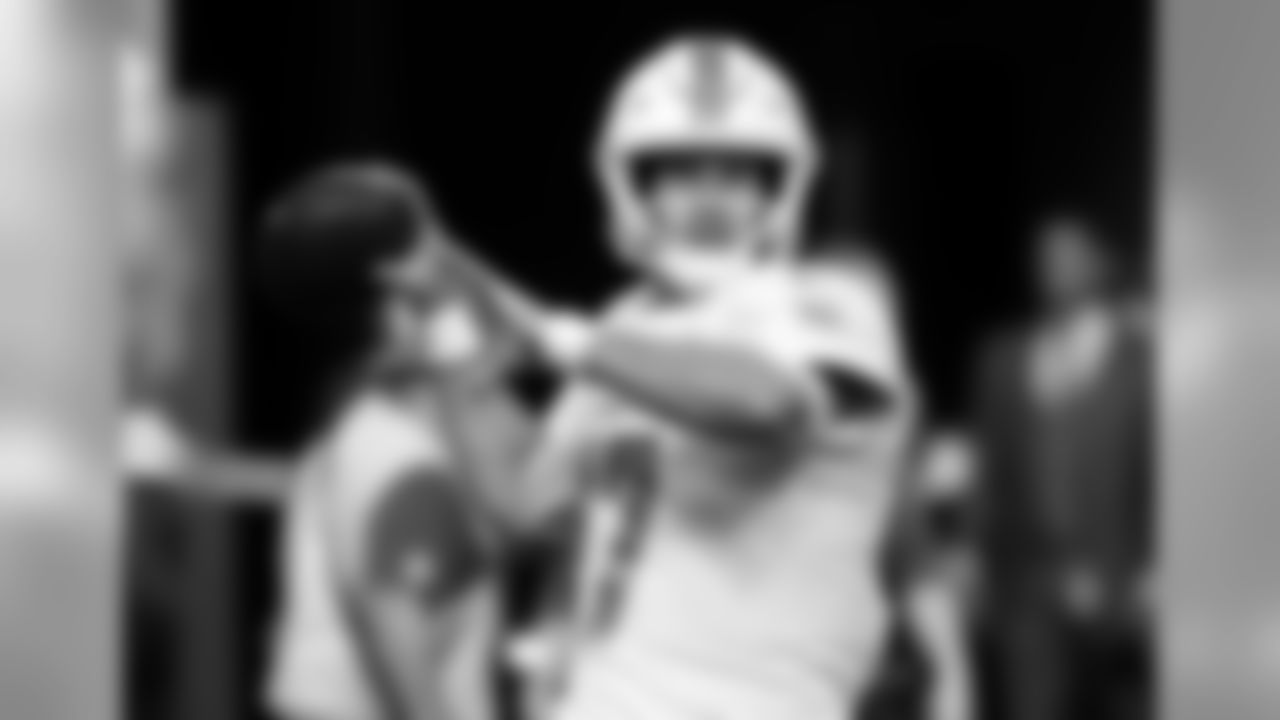 FILE - In this Dec. 16, 2018, file photo, Miami Dolphins quarterback Ryan Tannehill warms up before an NFL football game against the Minnesota Vikings, in Minneapolis. Tannehill, who became the Miami Dolphins’ starter in 2012 and has still never taken a postseason snap, may be about to play his final game for the franchise Sunday, Dec. 30. The Dolphins are wrapping up another disappointing season, and with Tannehill due a big raise this offseason, the team is expected to move on at quarterback. (AP Photo/Bruce Kluckhohn, File)