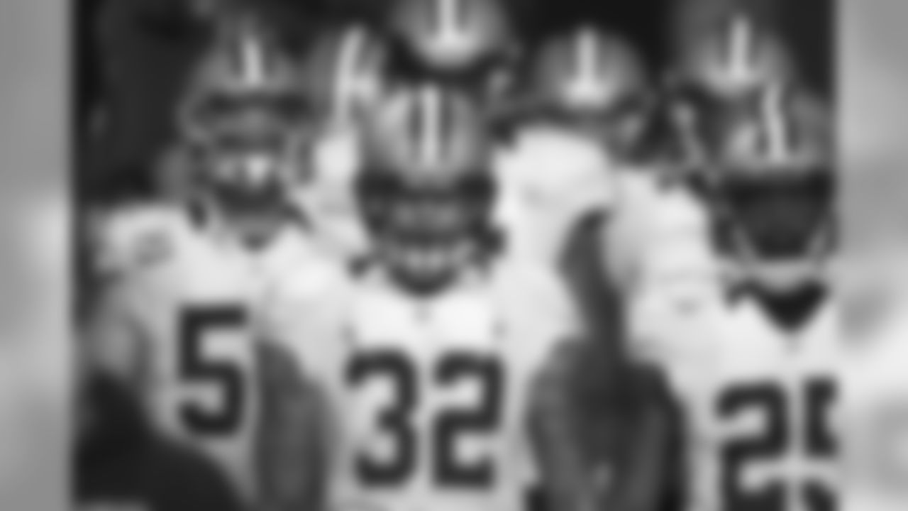 The New Orleans Saints Kenny Vaccaro (32) waits with teammates in the tunnel prior to the start of an NFL football game against the Seattle Seahawks, Monday, Dec. 2, 2013, in Seattle. (AP Photo/Scott Eklund)
