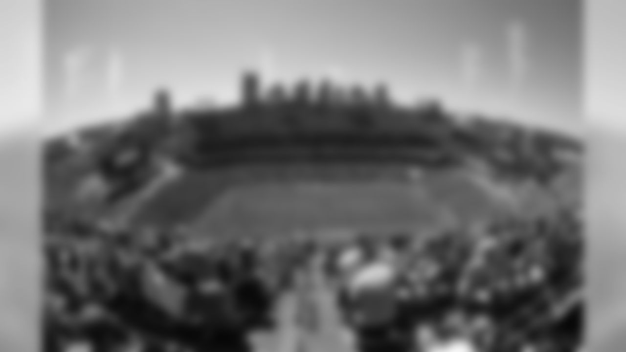 In this photo taken with a wide-angle lens, the Tennessee Titans battle the Oakland Raiders in the second half of an NFL football game at LP Field in Nashville, Tenn., Sunday, Sept. 12, 2010. (AP Photo/Frederick Breedon)