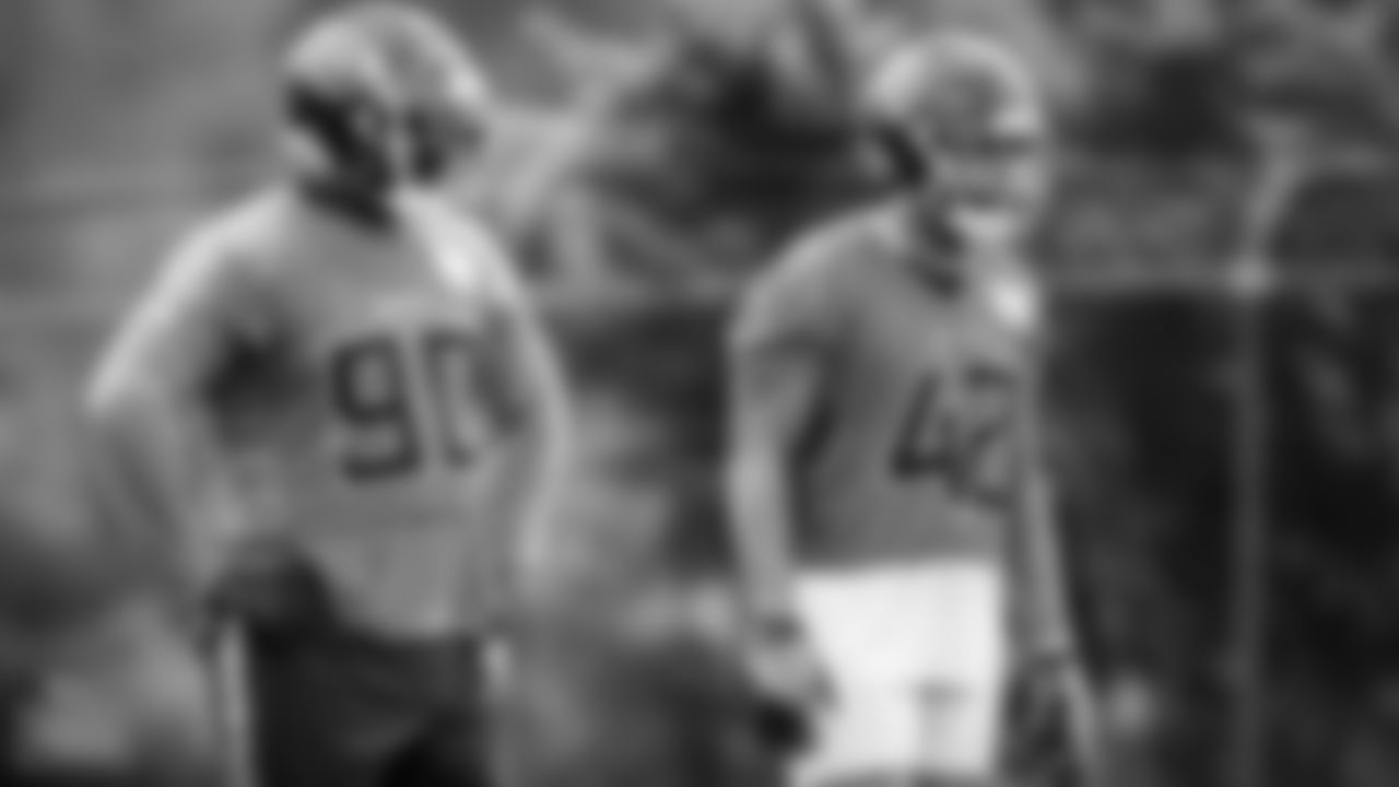 Defensive tackle Naquan Jones #90 of the Tennessee Titans and Outside linebacker Caleb Murphy #42 of the Tennessee Titans during offseason minicamp practice at Ascension Saint Thomas Sports Park on June 07, 2023 in Nashville, TN. Photo By Donald Page/Tennessee Titans