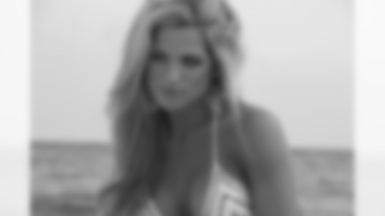 Tennessee Titans cheerleaders take part in a sunset photo shoot Tuesday afternoon at the Sandestin Golf and Beach Resort.
