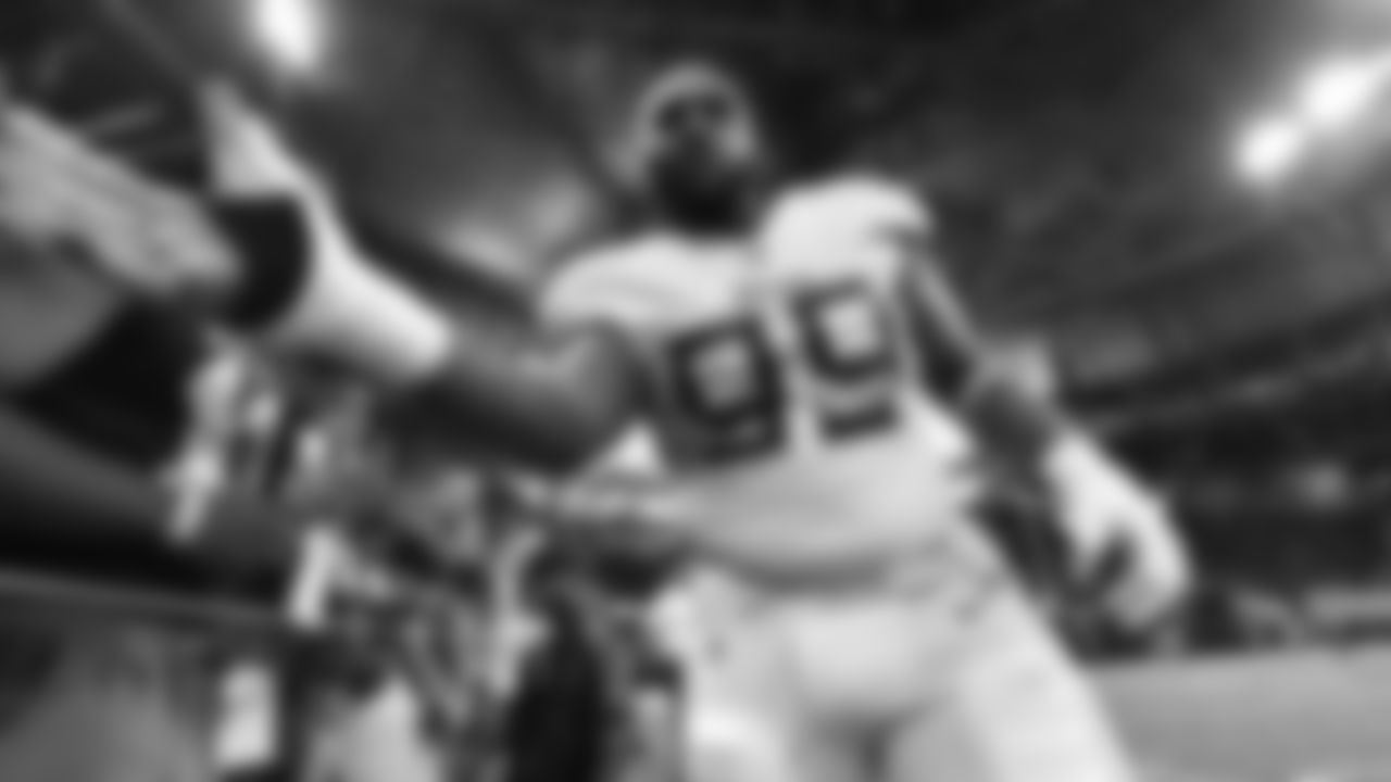 Tennessee Titans defensive end Jurrell Casey (99) greets fans before the first half of an NFL football game between the Atlanta Falcons and the Tennessee Titans, Sunday, Sept. 29, 2019, in Atlanta. (AP Photo/John Amis)