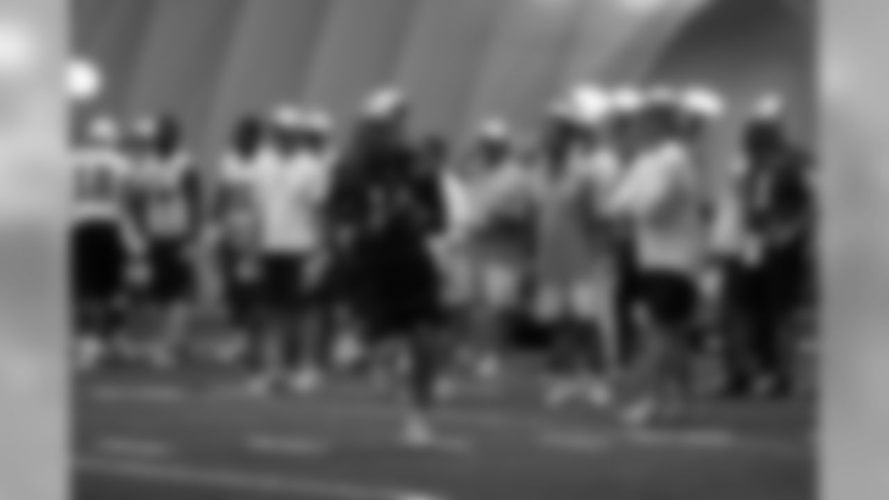 Titans players practice inside during Tuesday's organized training activity (OTA) at Baptist Sports Park in Nashville, Tenn.