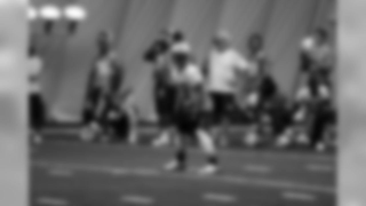 Titans players practice inside during Tuesday's organized training activity (OTA) at Baptist Sports Park in Nashville, Tenn.