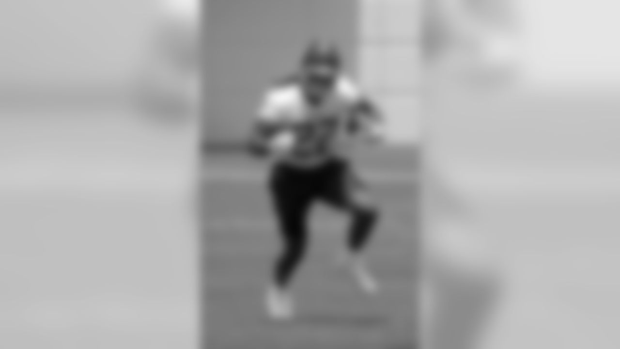 Tennessee Titans running back Derrick Henry (22) runs a drill during NFL football minicamp Tuesday, June 12, 2018, in Nashville, Tenn. (AP Photo/Mark Humphrey)
