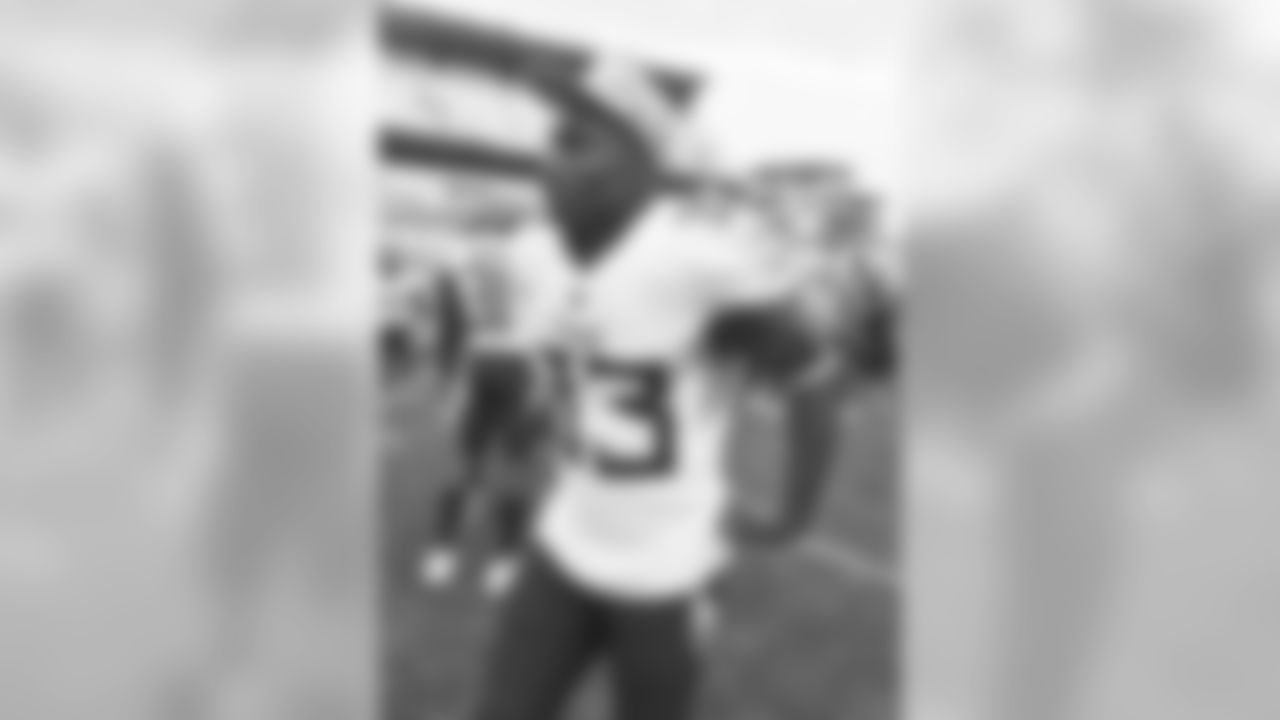 Tennessee Titans running back Dion Lewis (33) off the field after an NFL preseason football game against the Pittsburgh Steelers, Saturday, Aug. 25, 2018, in Pittsburgh. The Steelers won 16-6. (AP Photo/Don Wright)