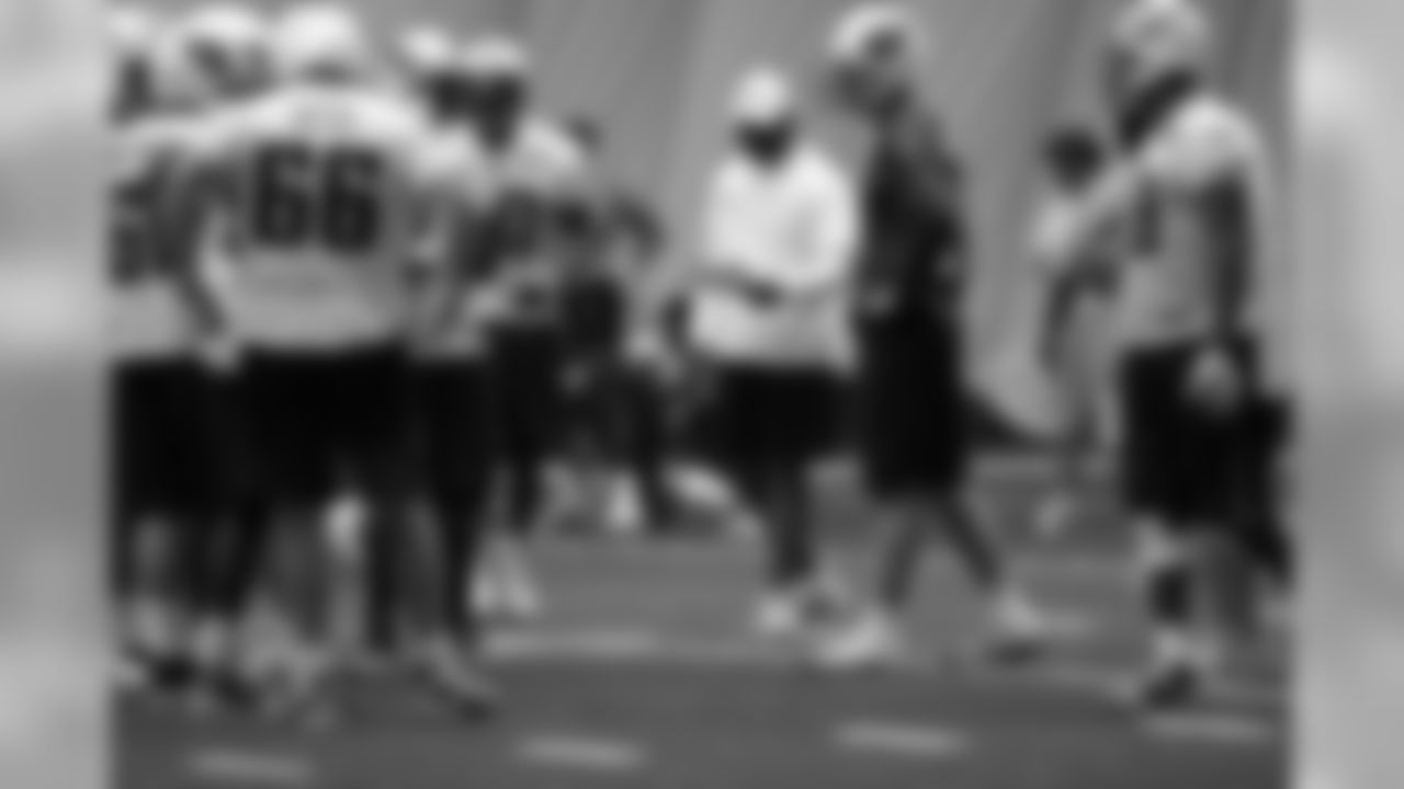 Titans players practice inside during Tuesday's organized training activity (OTA) at Baptist Sports Park in Nashville, Tenn.