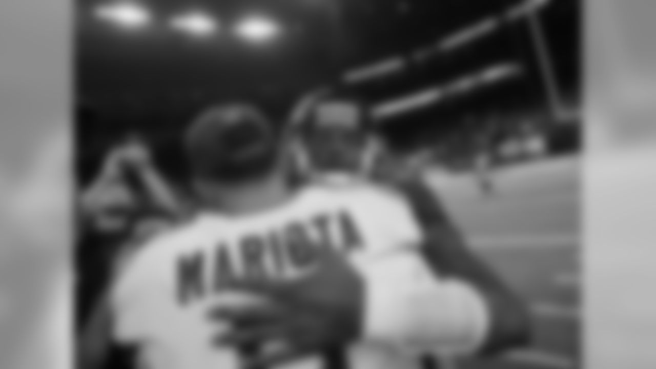 Tennessee Titans quarterback Marcus Mariota (8) and Houston Texans quarterback Deshaun Watson (4) greet on the field after an NFL football game, Monday, Nov. 26, 2018, in Houston. (AP Photo/David J. Phillip)