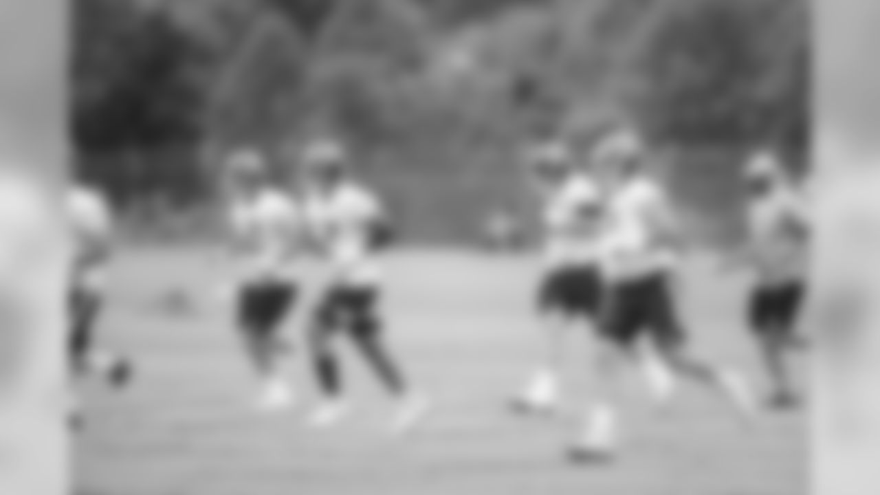 NASHVILLE, TN - JUNE 12, 2019 - The offensive line group runs across the sand during OTA practice in Nashville, TN. Photo By Donald Page/Tennessee Titans