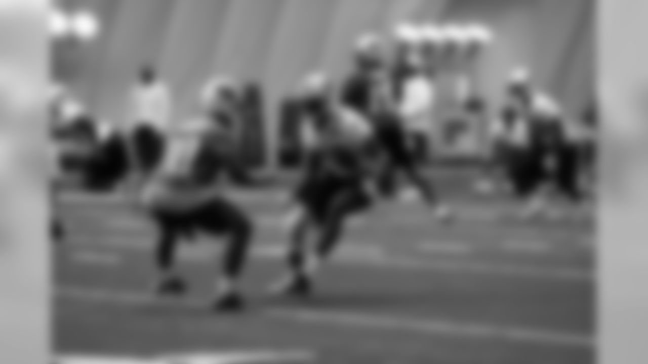 Titans players practice inside during Tuesday's organized training activity (OTA) at Baptist Sports Park in Nashville, Tenn.