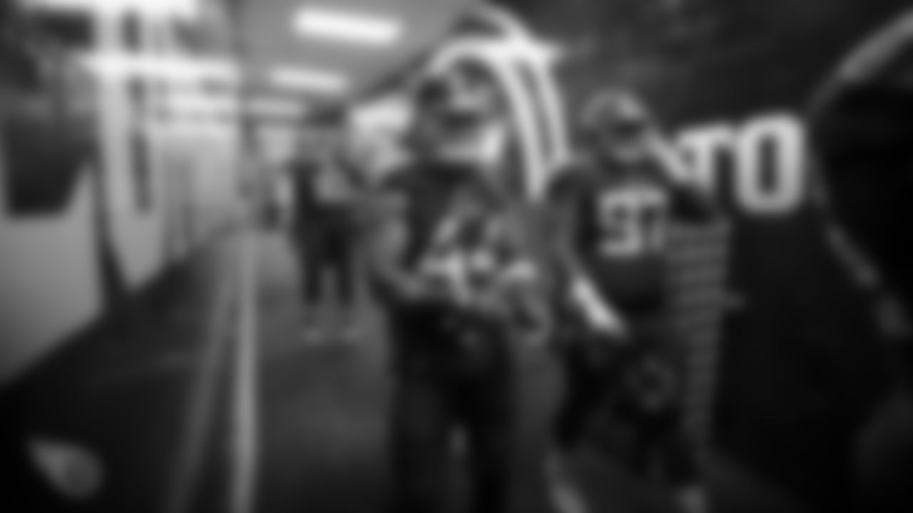 NASHVILLE, TN - AUGUST 25, 2019 - Outside linebacker Kamalei Correa #44 of the Tennessee Titans and Nose tackle Braxton Hoyett #97 of the Tennessee Titans leaving the locker room during the preseason home game between the Pittsburgh Steelers and the Tennessee Titans at Nissan Stadium in Nashville, TN. Photo By Donald Page/Tennessee Titans