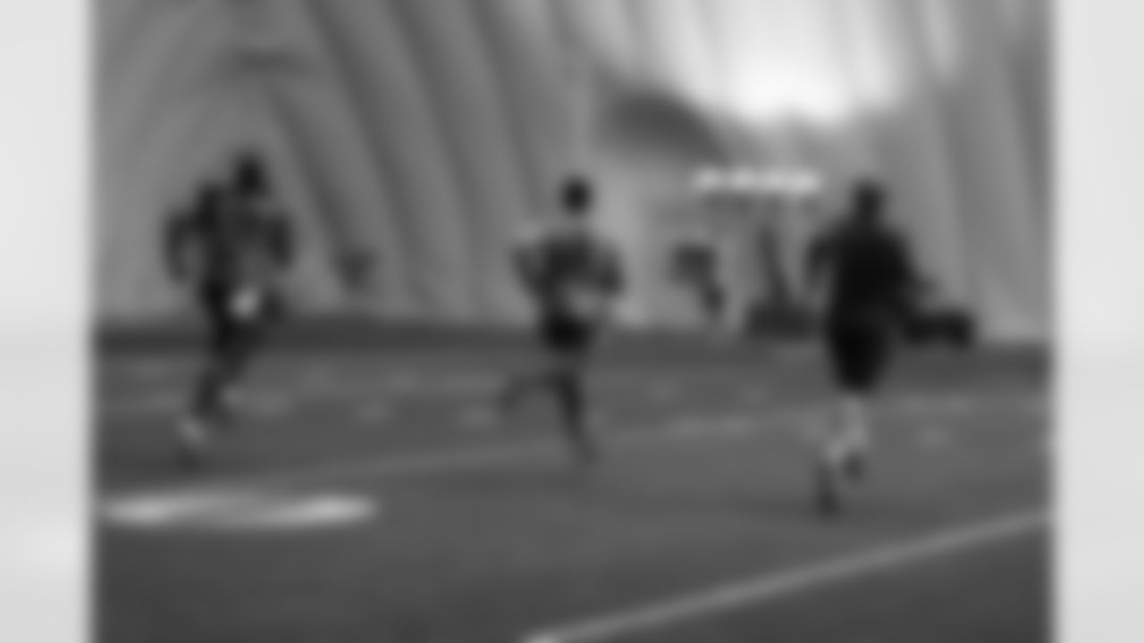 Titans players practice inside during Tuesday's organized training activity (OTA) at Baptist Sports Park in Nashville, Tenn.