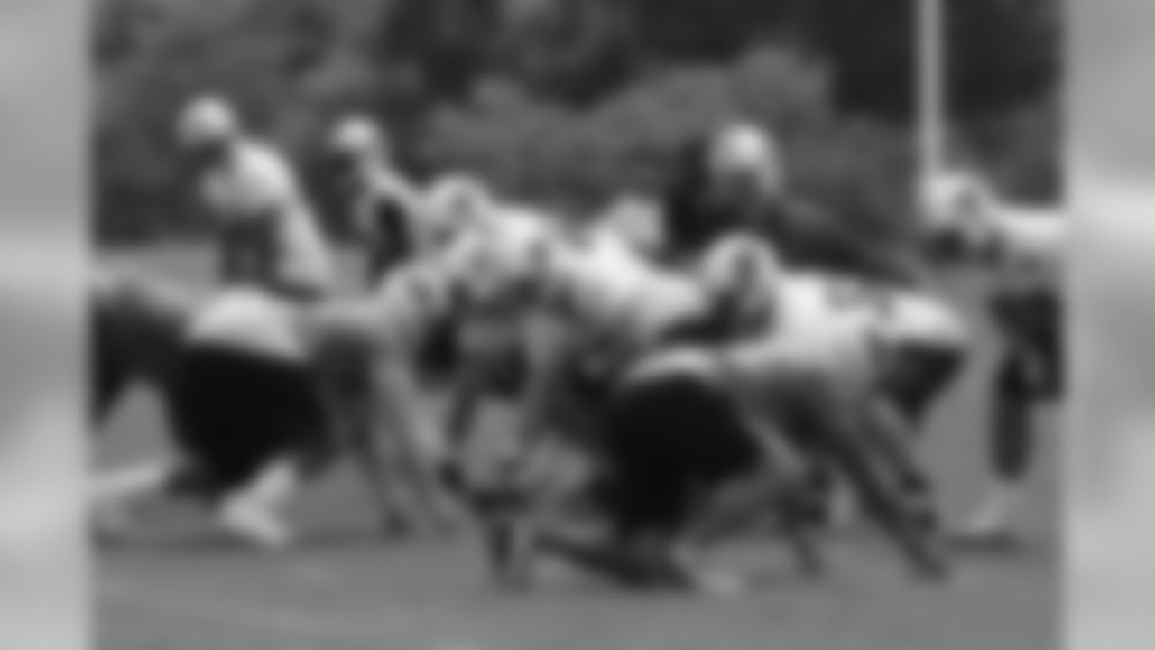 Titans players practice outside during Thursday's organized training activity (OTA) at Baptist Sports Park in Nashville, Tenn.