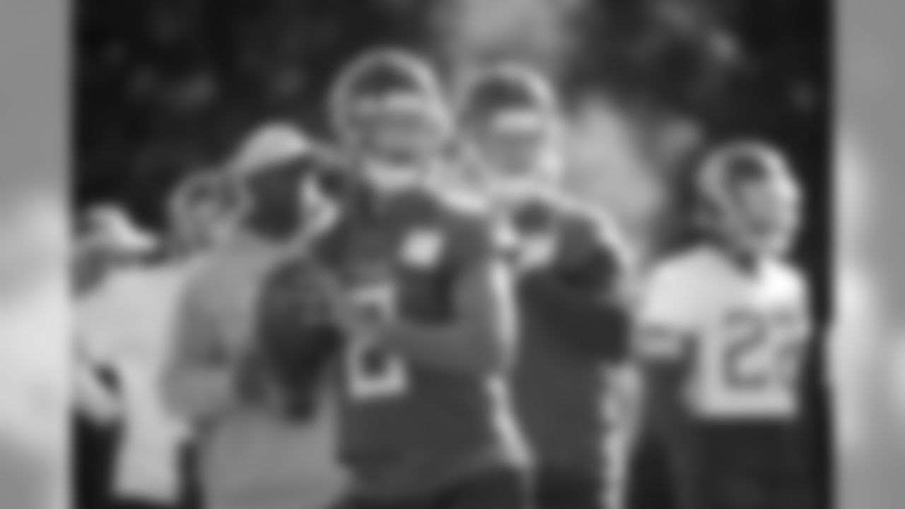 Tennessee Titans' quarterbacks Marcus Mariota, left, and Blaine Gabbert take part in an NFL training session at Syon House, in Syon Park, south west London, Friday, Oct. 19, 2018. The Tennessee Titans are preparing for an NFL regular season game against the Los Angeles Chargers in London on Sunday. (AP Photo/Matt Dunham)
