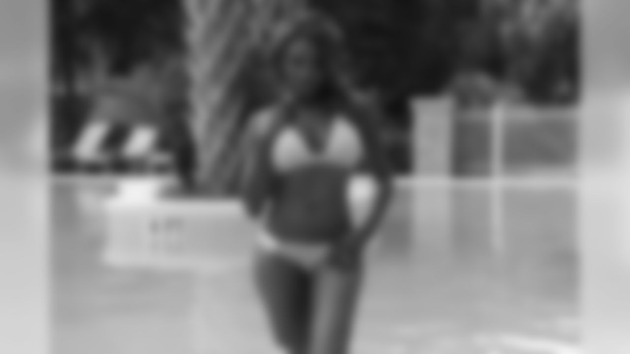 Tennessee Titans cheerleaders take part in a photo shoot Wednesday morning at the Sandestin Golf and Beach Resort.
