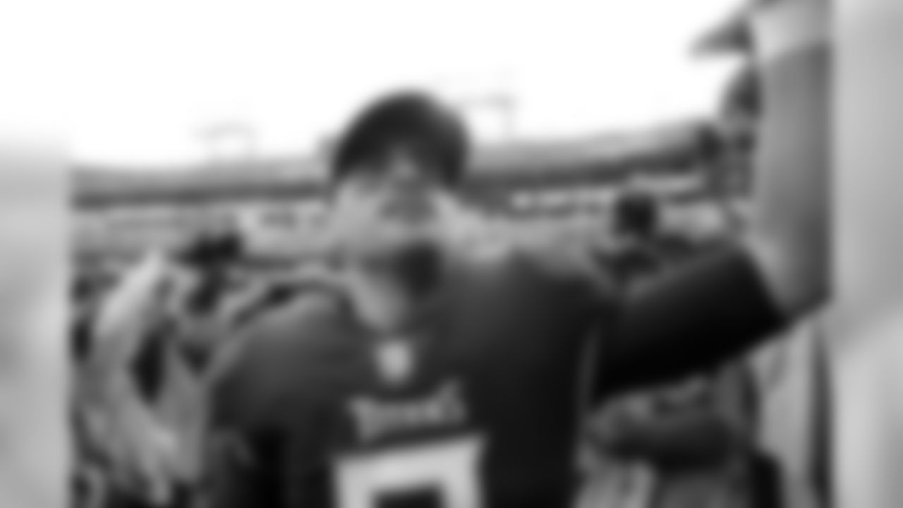 Tennessee Titans quarterback Marcus Mariota greets fans as he leaves the field after an NFL football game against the New England Patriots Sunday, Nov. 11, 2018, in Nashville, Tenn. The Titans won 34-10. (AP Photo/James Kenney)