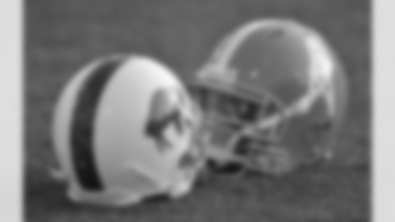 The Buffalo Bills and Tennessee Titans helmets lay on the ground before the the Hall of Fame football game at the Pro Football Hall of Fame Sunday, Aug. 9, 2009, in Canton, Ohio. (AP Photo/David Richard)