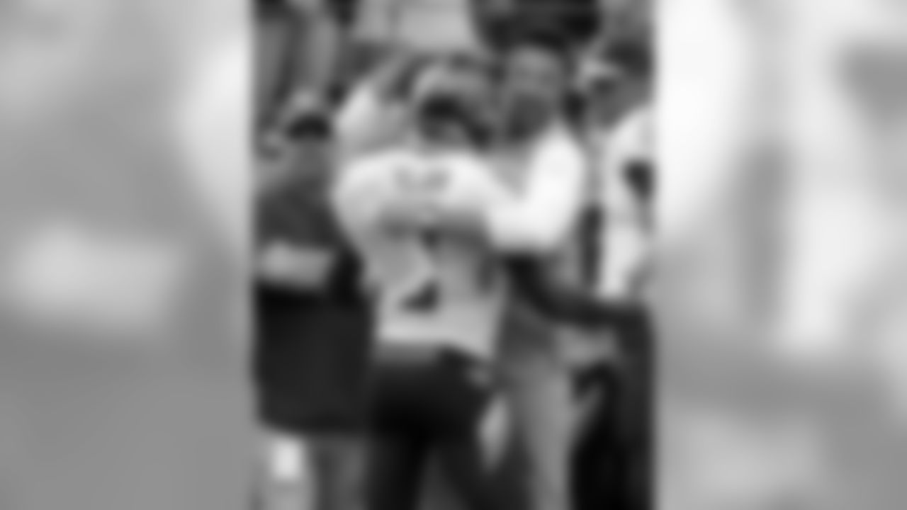 Tennessee Titans head coach Mike Vrabel celebrates with wide receiver Taywan Taylor (13) after Taylor scored a touchdown against the Houston Texans in the first half of an NFL football game Sunday, Sept. 16, 2018, in Nashville, Tenn. (AP Photo/Mark Zaleski)