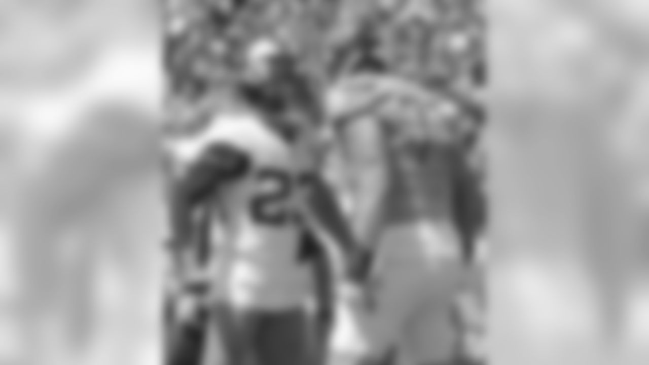Jacksonville Jaguars defensive back Tyler Patmon (23) confronts Tennessee Titans offensive tackle Taylor Lewan (77) after a play during the first half of an NFL football game, Sunday, Sept. 23, 2018, in Jacksonville, Fla. (AP Photo/Phelan M. Ebenhack)