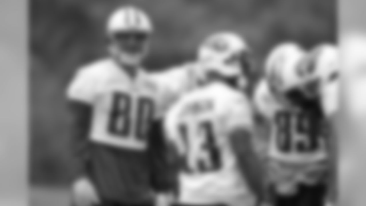 Titans veteran and rookie players practice during Tuesday's organized training session at Baptist Sports Park in Nashville, Tenn.