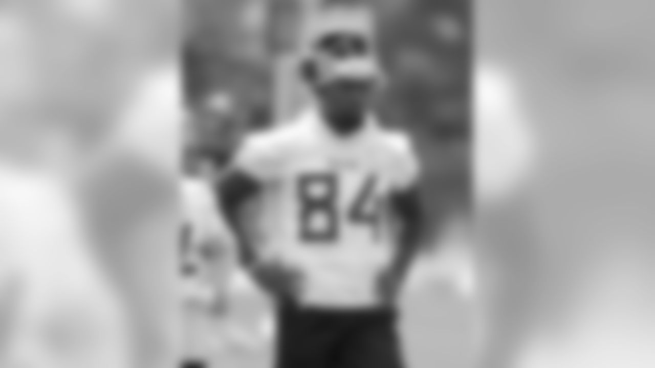Tennessee Titans wide receiver Corey Davis (84) waits for his turn to run a drill during an organized team activity at the Titans' NFL football training facility Tuesday, June 11, 2019, in Nashville, Tenn. (AP Photo/Mark Humphrey)
