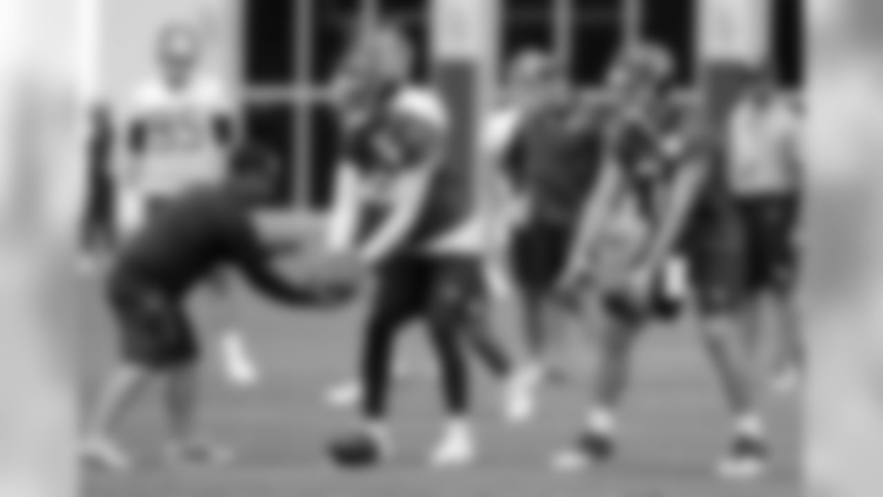 Tennessee Titans quarterbacks Marcus Mariota (8) and Blaine Gabbert (7) run a drill during an organized team activity at the Titans' NFL football training facility Wednesday, May 30, 2018, in Nashville, Tenn. (AP Photo/Mark Humphrey)