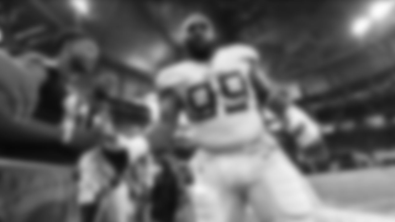Tennessee Titans defensive end Jurrell Casey (99) greets fans before the first half of an NFL football game between the Atlanta Falcons and the Tennessee Titans, Sunday, Sept. 29, 2019, in Atlanta. (AP Photo/John Amis)
