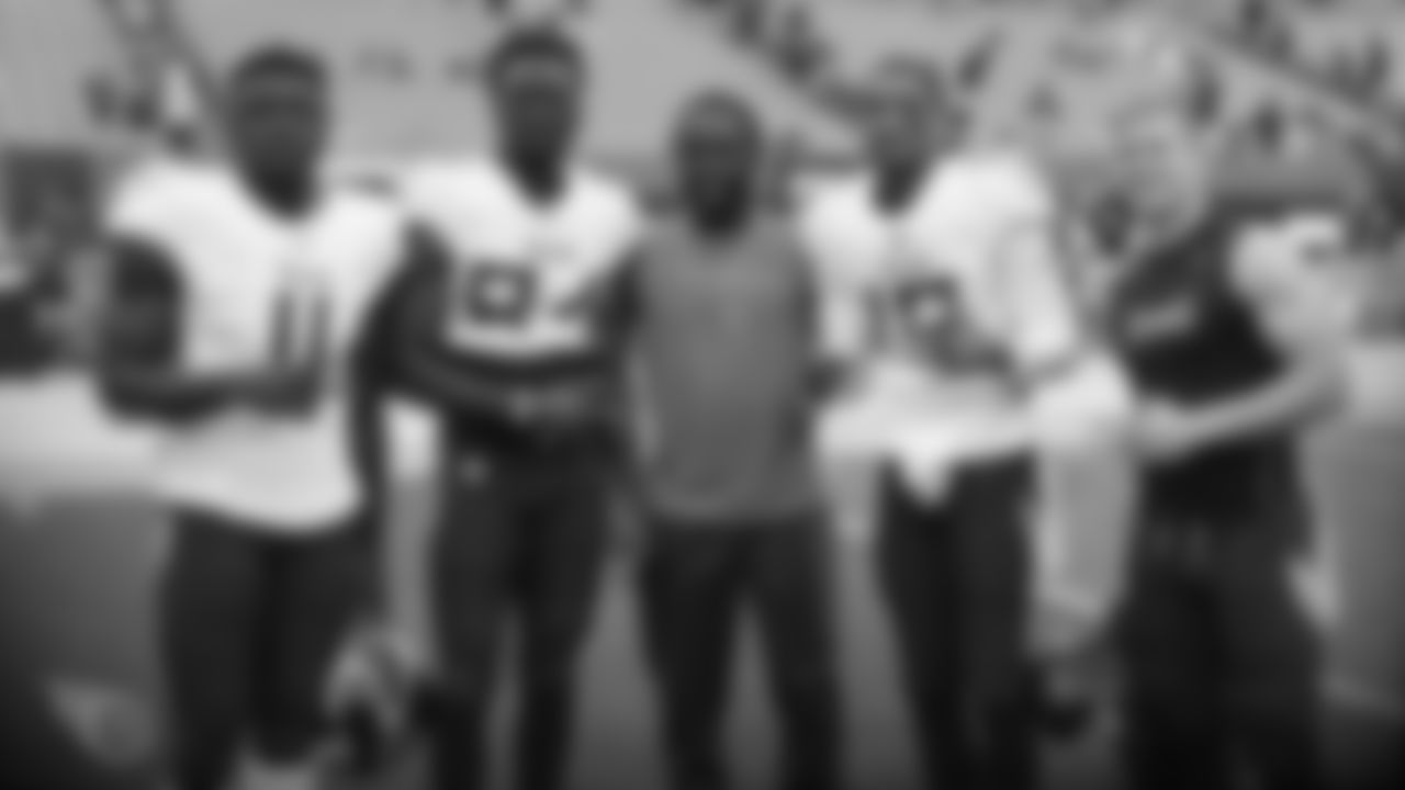 Tennessee Titans wide receiver A.J. Brown (11), wide receiver Corey Davis (84), wide receiver Tajae Sharpe (19) and wide receiver Adam Humphries (10) pose for a photo with Cleveland Browns wide receiver Taywan Taylor, center, following an NFL football game, Sunday, Sep. 8, 2019 in Cleveland. (Aaron Doster/NFL)