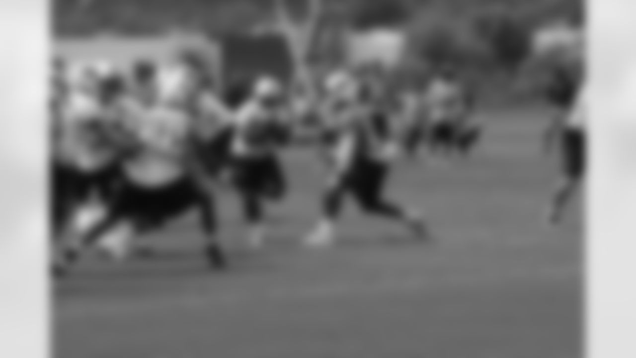 Titans players practice outside during Thursday's organized training activity (OTA) at Baptist Sports Park in Nashville, Tenn.