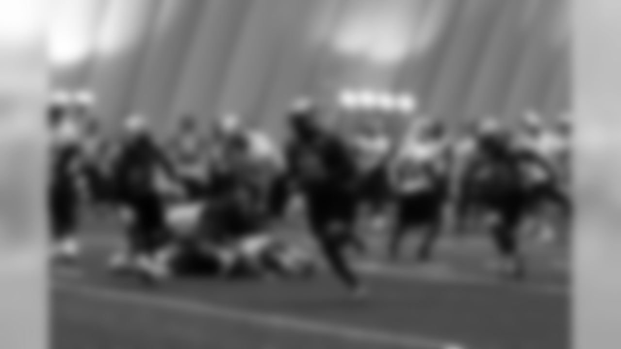 Titans players practice inside during Tuesday's organized training activity (OTA) at Baptist Sports Park in Nashville, Tenn.