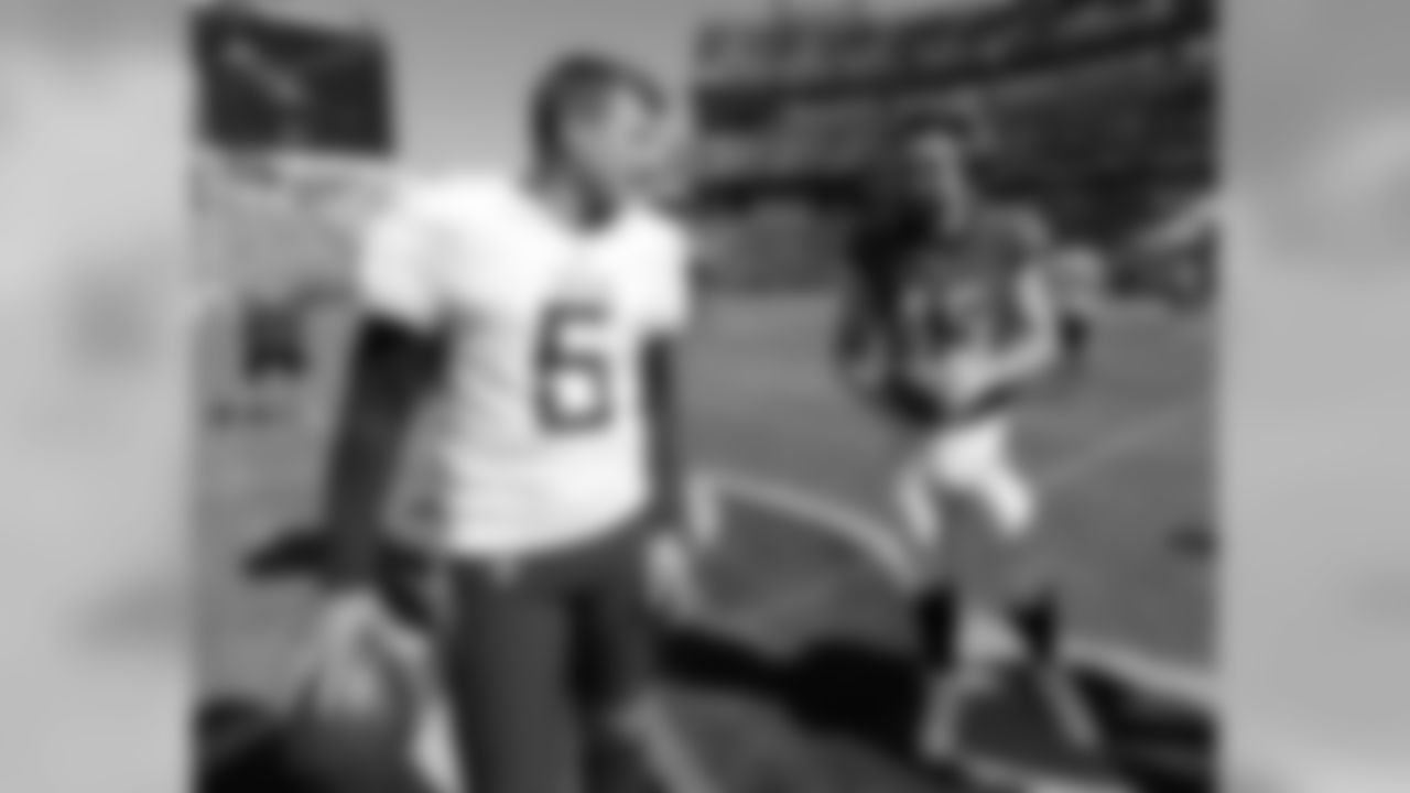 Tennessee Titans punter Brett Kern (6) talks with Philadelphia Eagles long snapper Rick Lovato (45) before an NFL football game Sunday, Sept. 30, 2018, in Nashville, Tenn. (AP Photo/Mark Zaleski)
