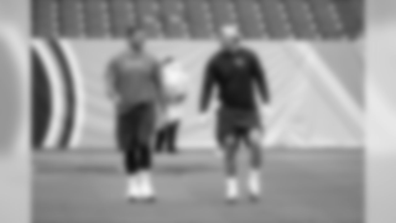 Tennessee Titans offensive tackle Jack Conklin, left, and offensive tackle Taylor Lewan warms up before an NFL football game against the Baltimore Ravens Sunday, Oct. 14, 2018, in Nashville, Tenn. (AP Photo/James Kenney)