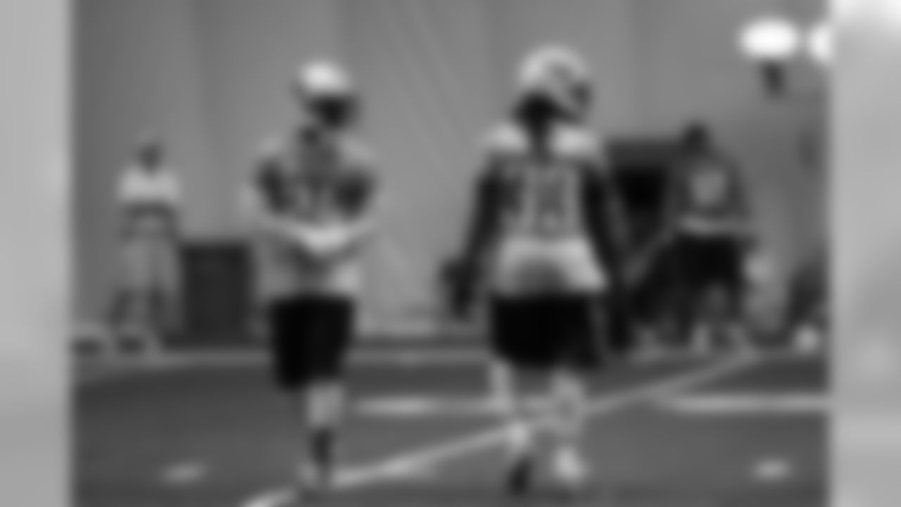 Titans players practice inside during Tuesday's organized training activity (OTA) at Baptist Sports Park in Nashville, Tenn.
