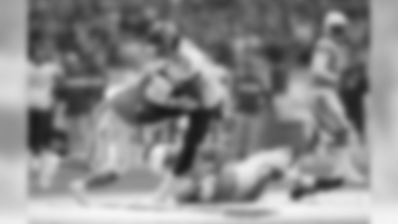 Tennessee Titans tight end Jonnu Smith (81) is tackled during the first half of an NFL football game against Los Angeles Chargers at Wembley stadium in London, Sunday, Oct. 21, 2018. (AP Photo/Matt Dunham)