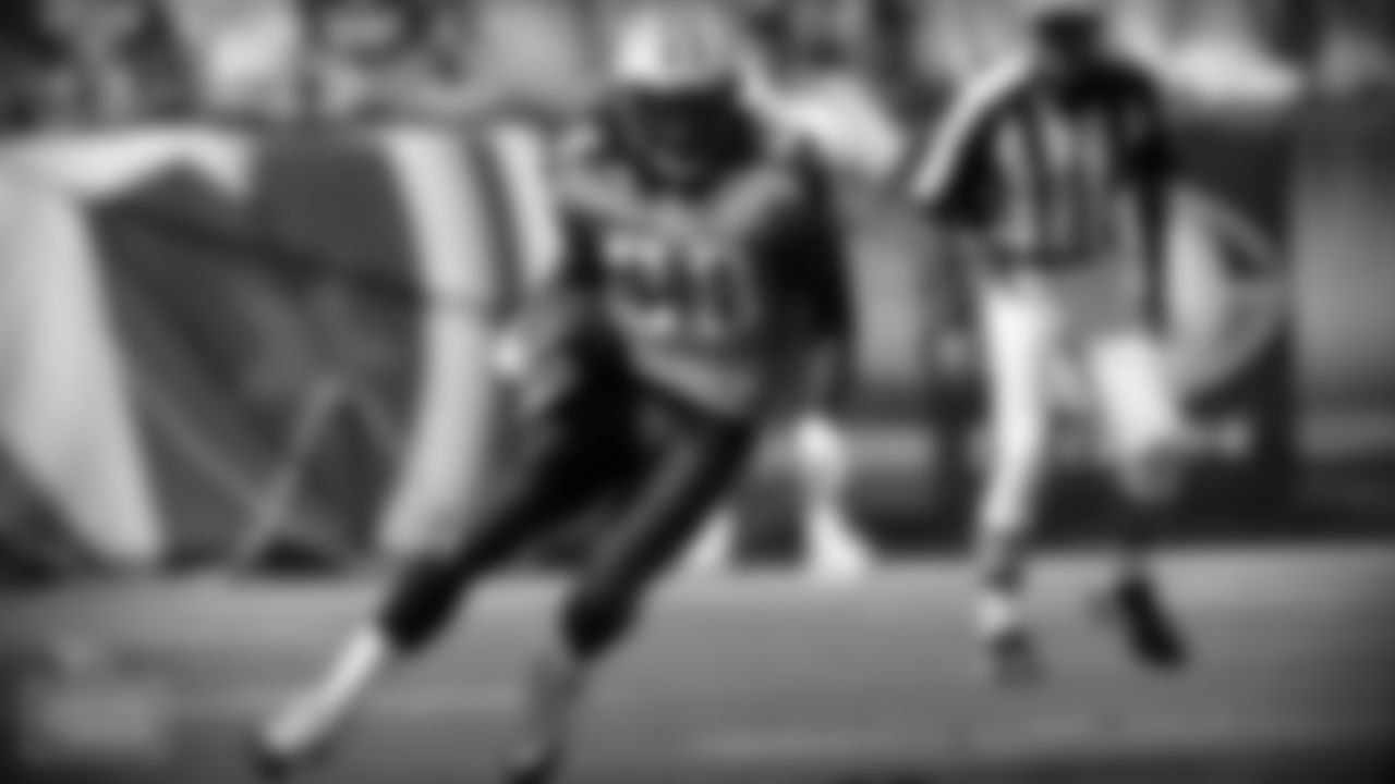 Tennessee Titans running back Chris Johnson (28) is shown in an NFL football game in Nashville, Tenn., Sunday, Sept. 28, 2008. (AP Photo/John Russell)